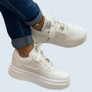 TENIS SUELA ALTA ACCESORIO EN LA LENGUA Y EN CORDONES